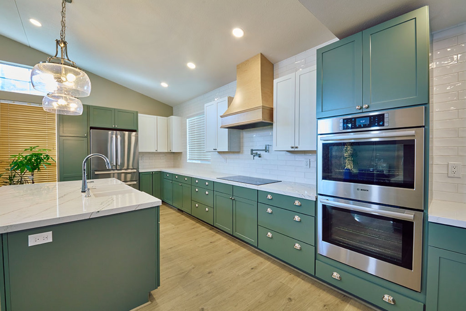 Custom kitchen remodel with island and double wall oven
